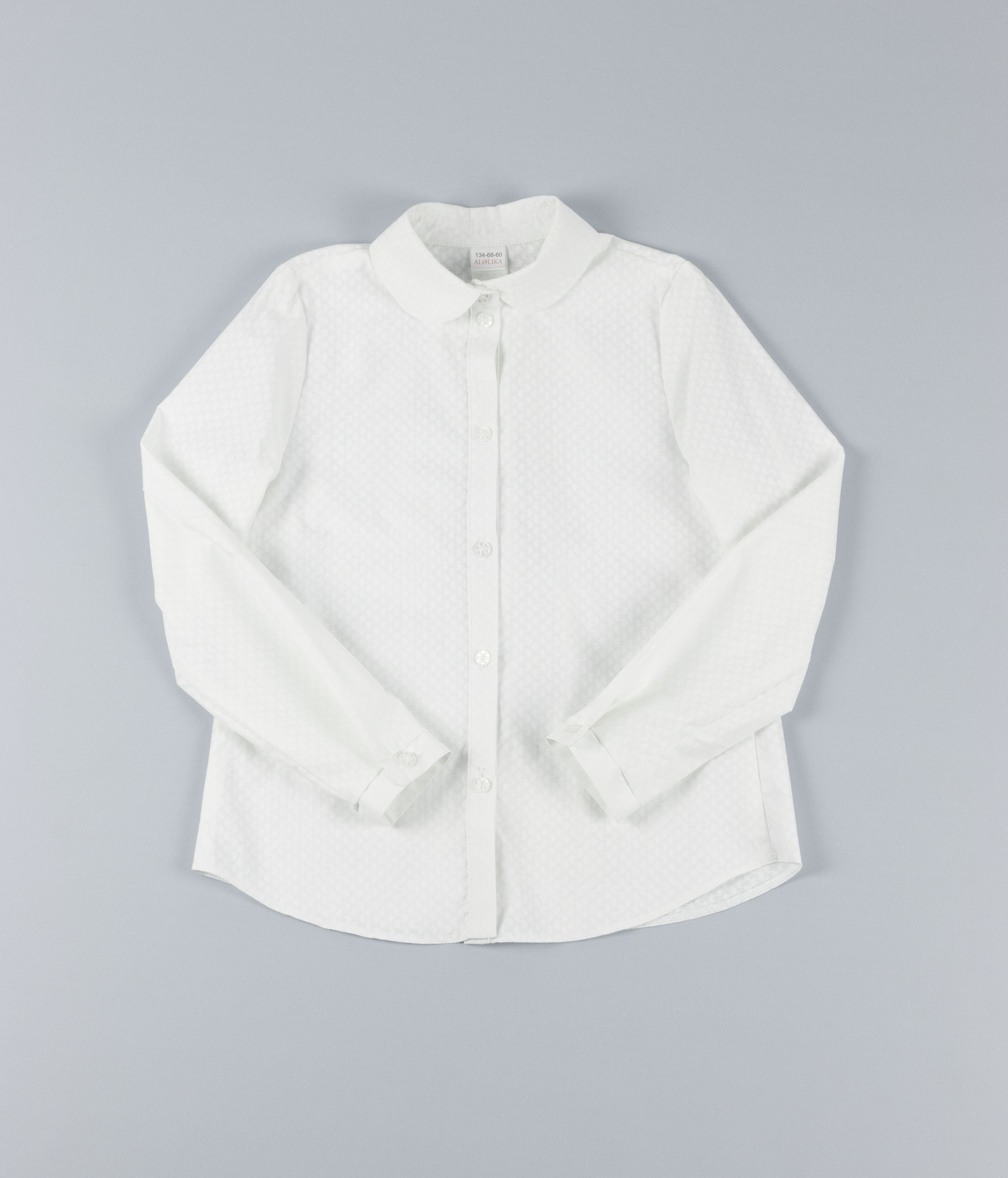 Белая блузка с принтом и со съёмной брошью